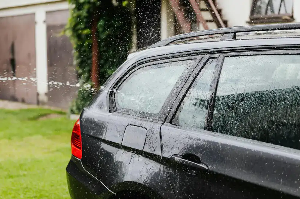 Car being washed on a home driveway